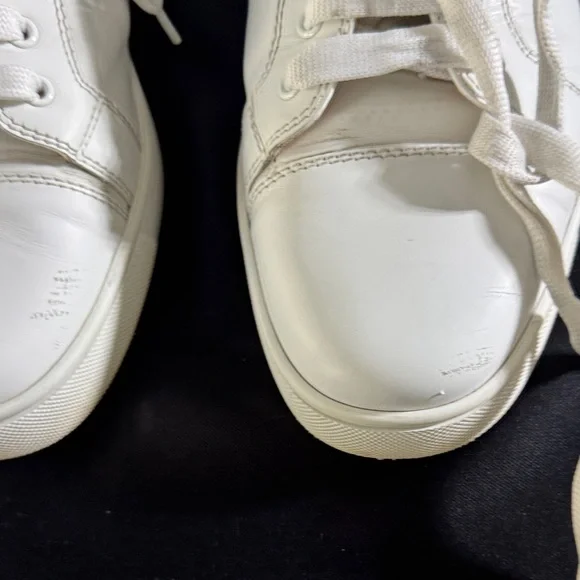 Christian Louboutin Men’s White Leather Sneakers with Iconic Red Soles